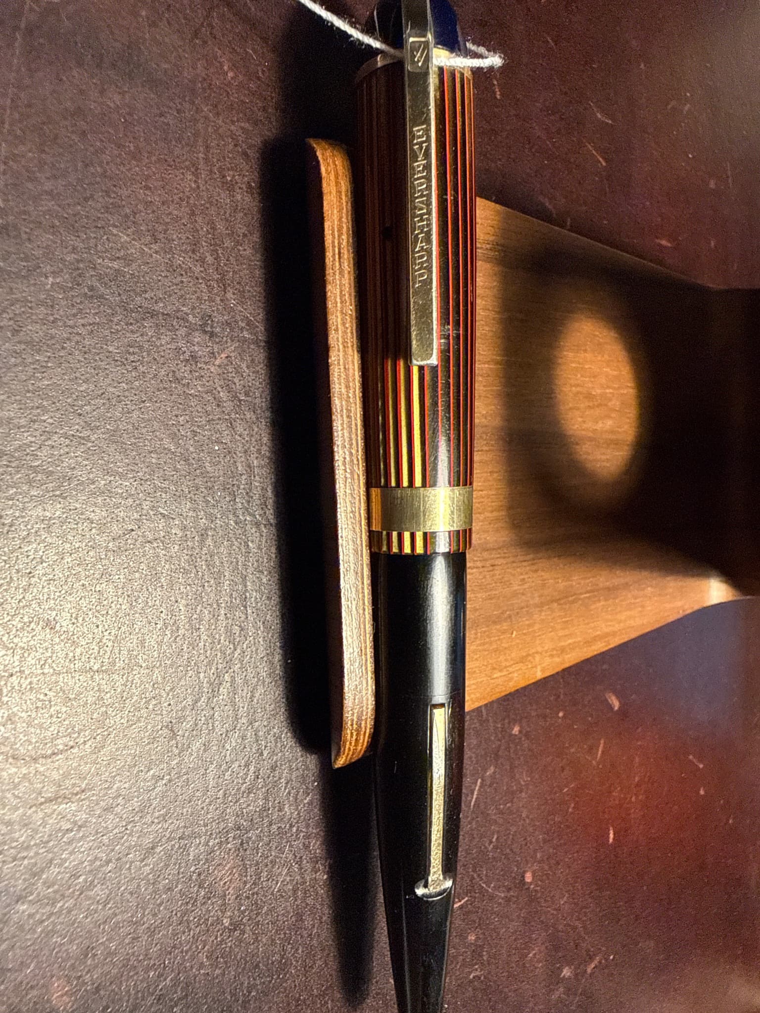 Eversharp Doric (or Symphony/Pacemaker era derivative based on striped celluloid and cap band design)