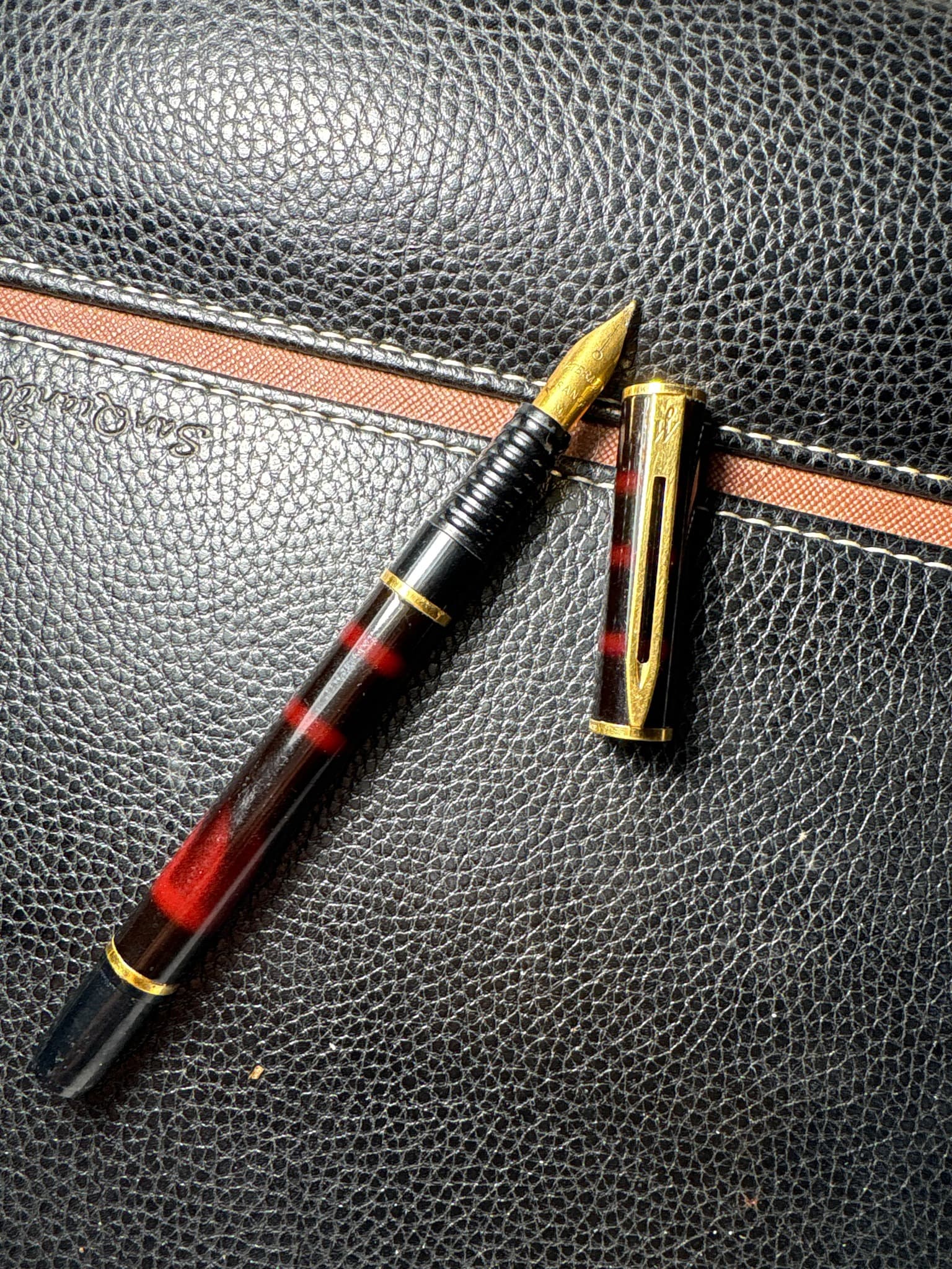 Waterman Patrician (or similar vintage Red Ripple / Lucite model)