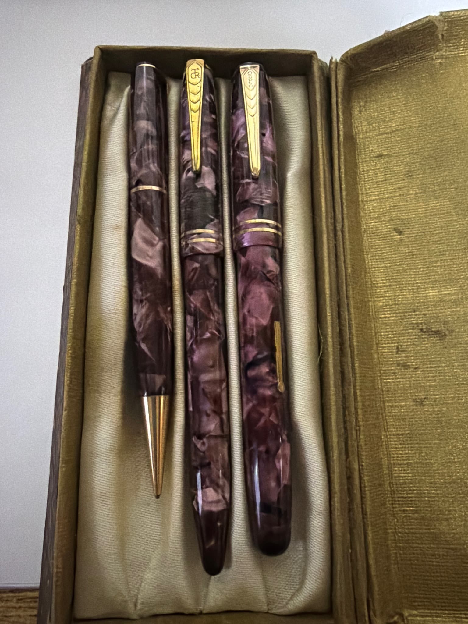 Conklin Endura (or similar vintage set featuring a fountain pen, pencil, and possibly a second pen/pencil)